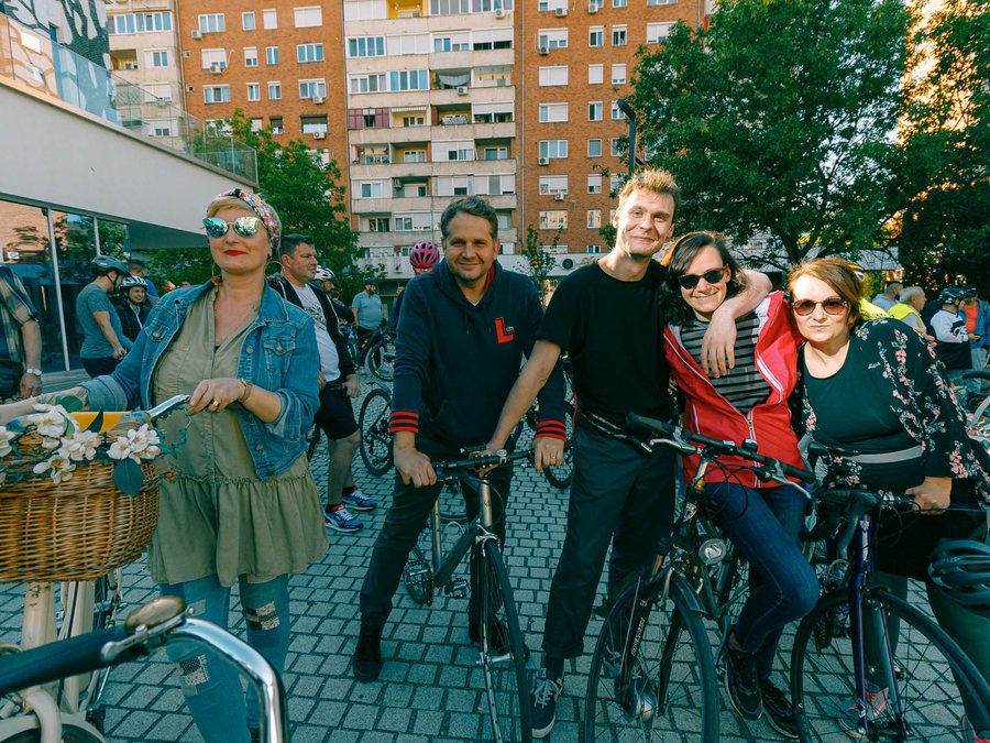 Young people with bikes in the city